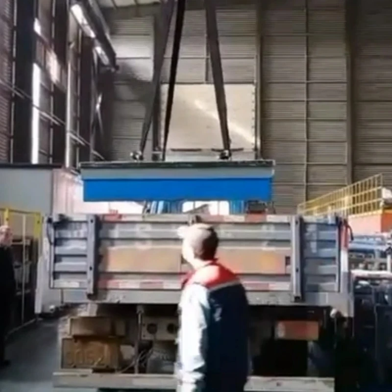 The Cast Iron Platform Is Being Loaded Onto The Vehicle For Shipment